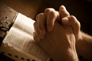 hand of a person praying